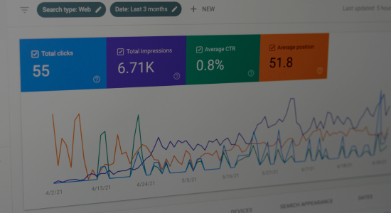 Landing image - A close-up photo of the Google Search Console UI - showing the key metrics block and chart view immediately below
